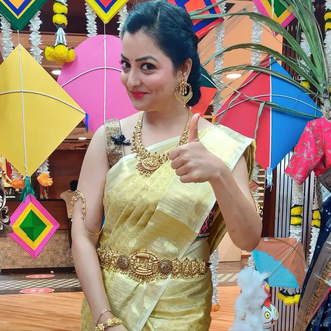 ETV ABHIRUCHI MADHURI KANDAVALLI TRADITIONAL IN YELLOW SAREE